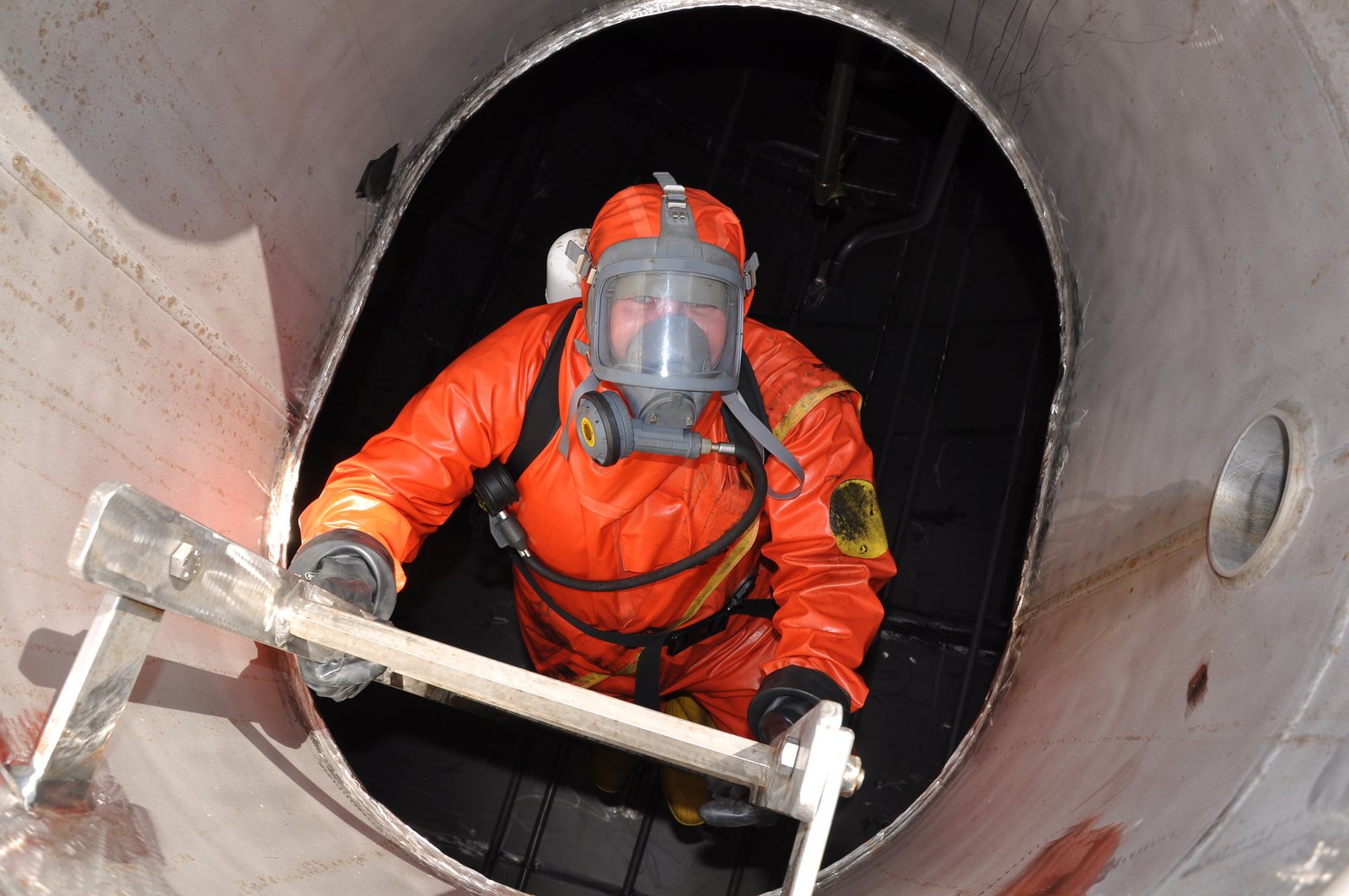 man in chemical suit
