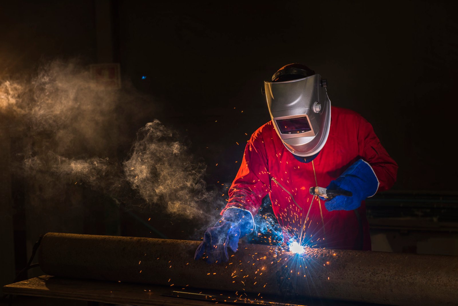Workshop welder in Red uniform
